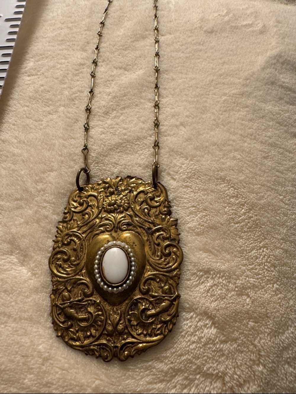 Ornate Gold Filigree Pendant Necklace with White Cabochon